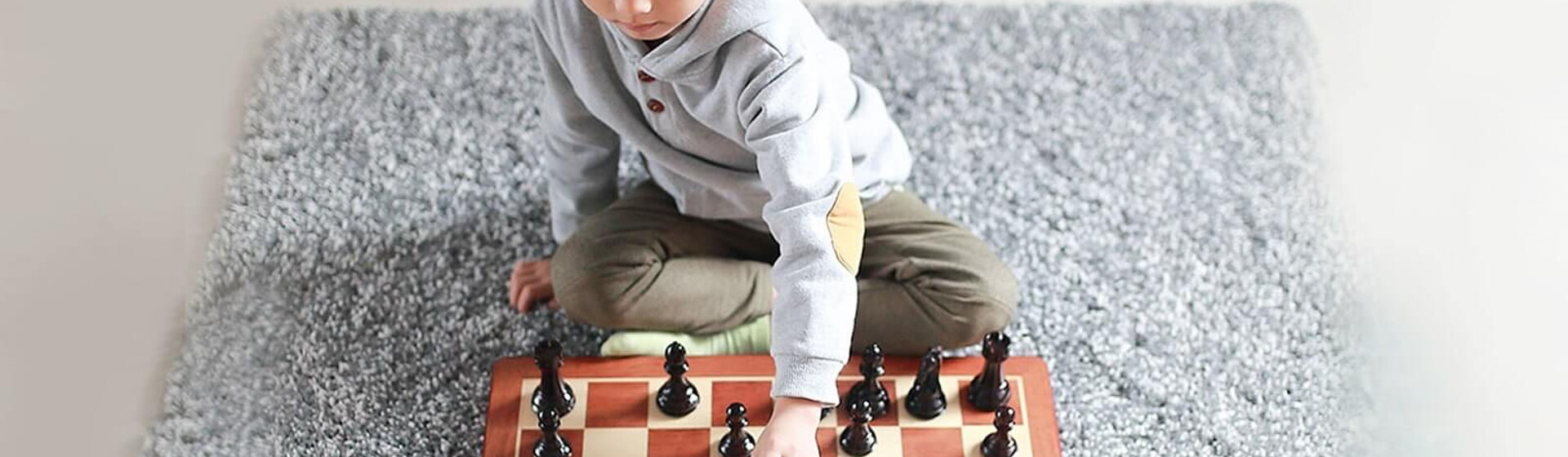 boy playing chess