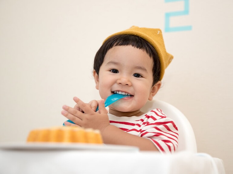 child with cake